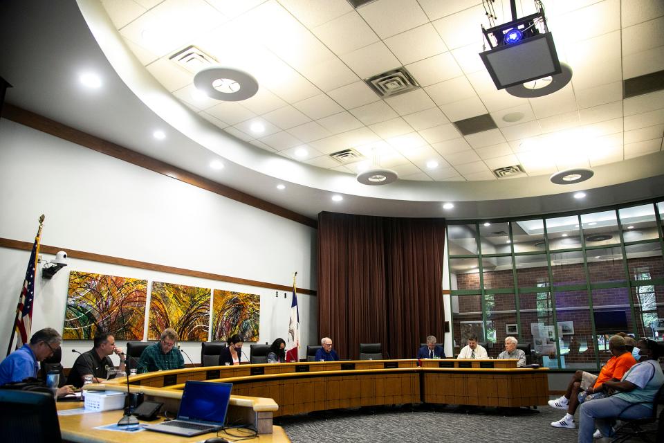Coralville City Councilors, from left, Mike Knudson, Mitch Gross, Coralville city clerk Thorsten J. Johnson, Meghann Foster, mayor of Coralville, councilors Hai Huynh and Keith Jones listen during a meeting during a council meeting, Tuesday, June 14, 2022, in Coralville, Iowa.