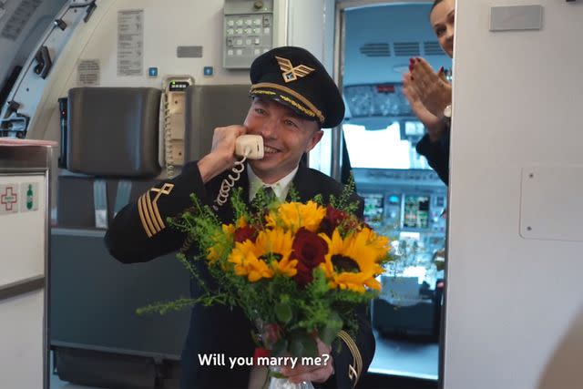 <p>LOT Polish Airlines Facebook</p> Captain Konrad proposing