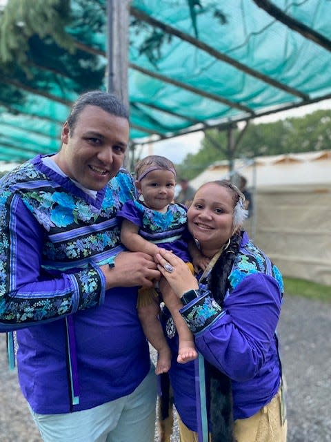 Mashpee Wampanoag Tribe members Brian Weeden, Keturah Peters and their son Epenow, are wearing Eastern Woodland tribal regalia. Each aspect of traditional dress, said Peters, has cultural significance and meaning.
