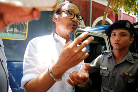 Filmmaker Min Htin Ko Ko Gyi talks to media at Insein court in Yangon,