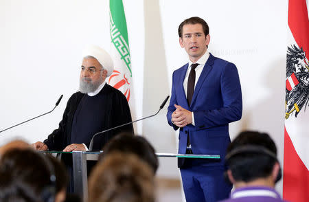 Iran's President Hassan Rouhani and Austria's Chancellor Sebastian Kurz attend a news conference at the Chancellery in Vienna, Austria July 4, 2018. REUTERS/Lisi Niesner