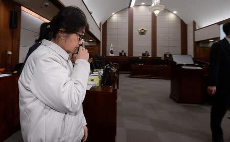 Choi Soon-sil, a long-time friend of South Korean President Park Geun-hye who is at the center of the South Korean political scandal involving Park, arrives for her first court hearing in Seoul, South Korea, December 19, 2016. Korea Pool/via REUTERS