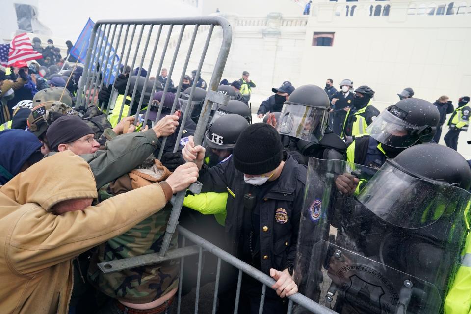 Police tried to hold back the pro-Trump mob attempting to get into the Capitol on Jan. 6.  (Kent Nishimura/Getty Images)