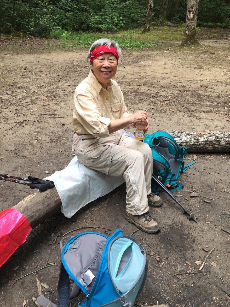 Sue Hung takes a break during a hike in her later years. The well-liked resident and native Chinese woman, who had come to Knoxville in the early 1960s with her husband, Dr. Jim Hung, died March 11 at the age of 89.