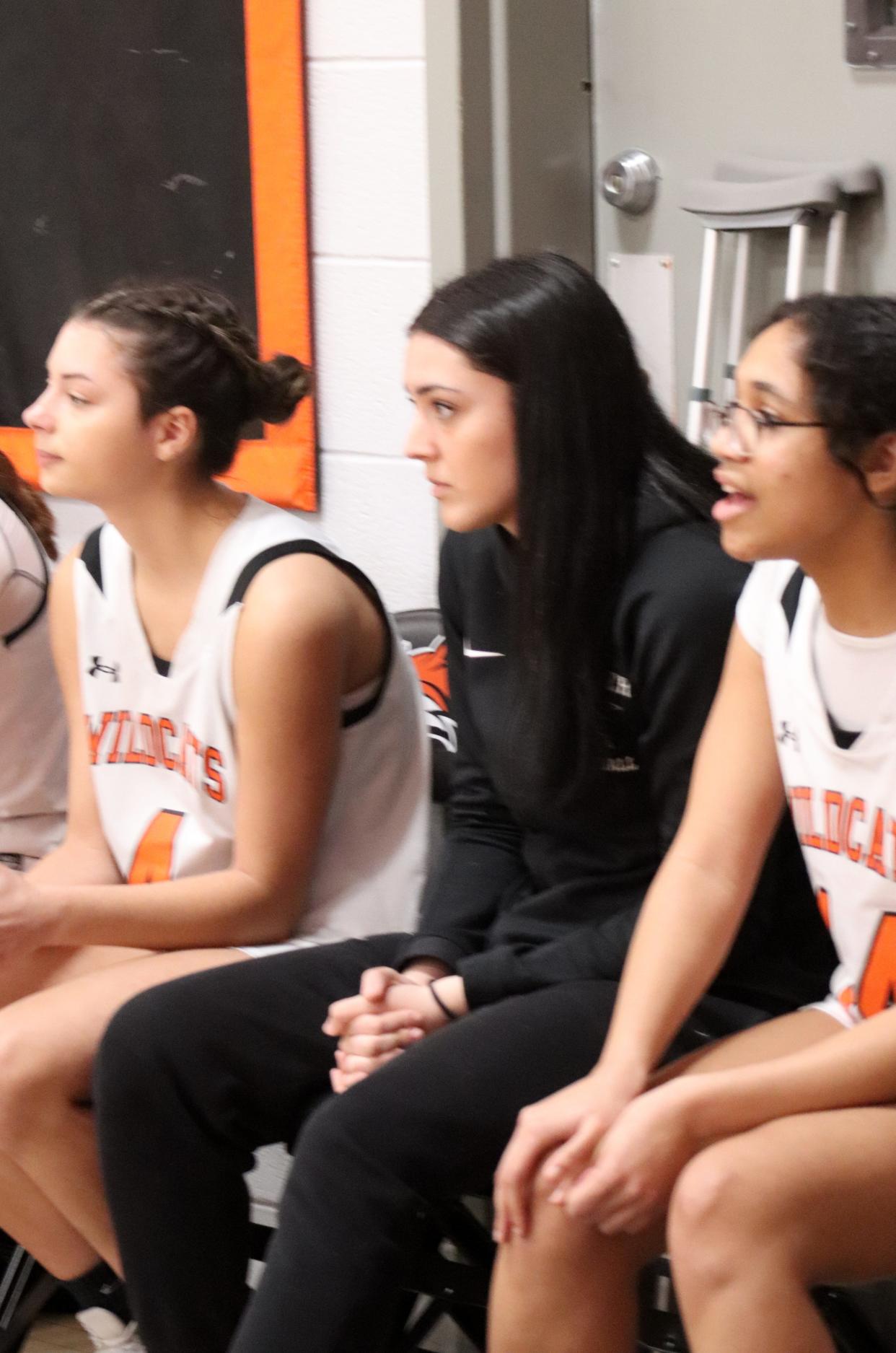 Gardner's leading scorer, Tati Vazquez, out of the lineup with an ankle injury, watches the action as the Wildcats defeat South Lancaster Academy on February 26, 2024. Vazquez leads the Mid-Wach D in scoring, averaging 17 points a game.