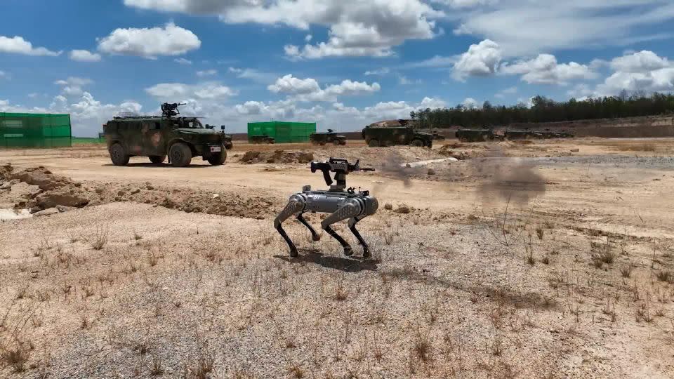China's military displayed a machine gun equipped robot battle "dog" during joint drills with Cambodia - CCTV