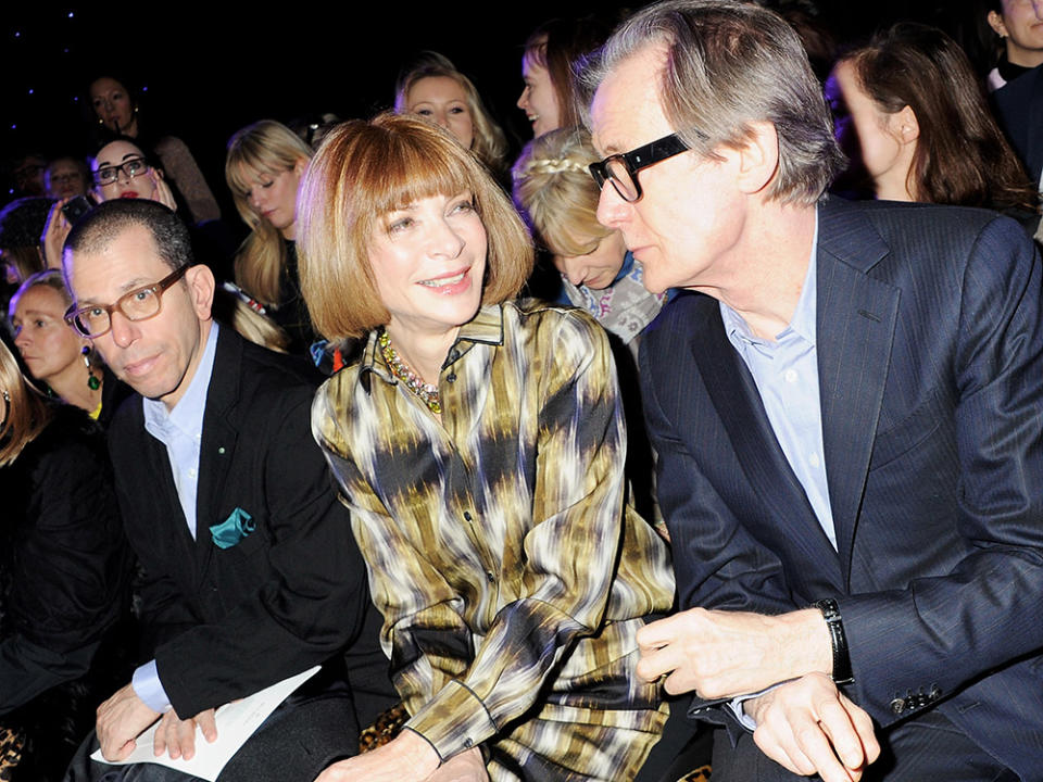 (L to R) Jonathan Newhouse, Anna Wintour and Bill Nighy sit in the front row at the Mulberry Autumn/Winter 2012 show during London Fashion Week at Claridge's Hotel on February 19, 2012 in London, England.