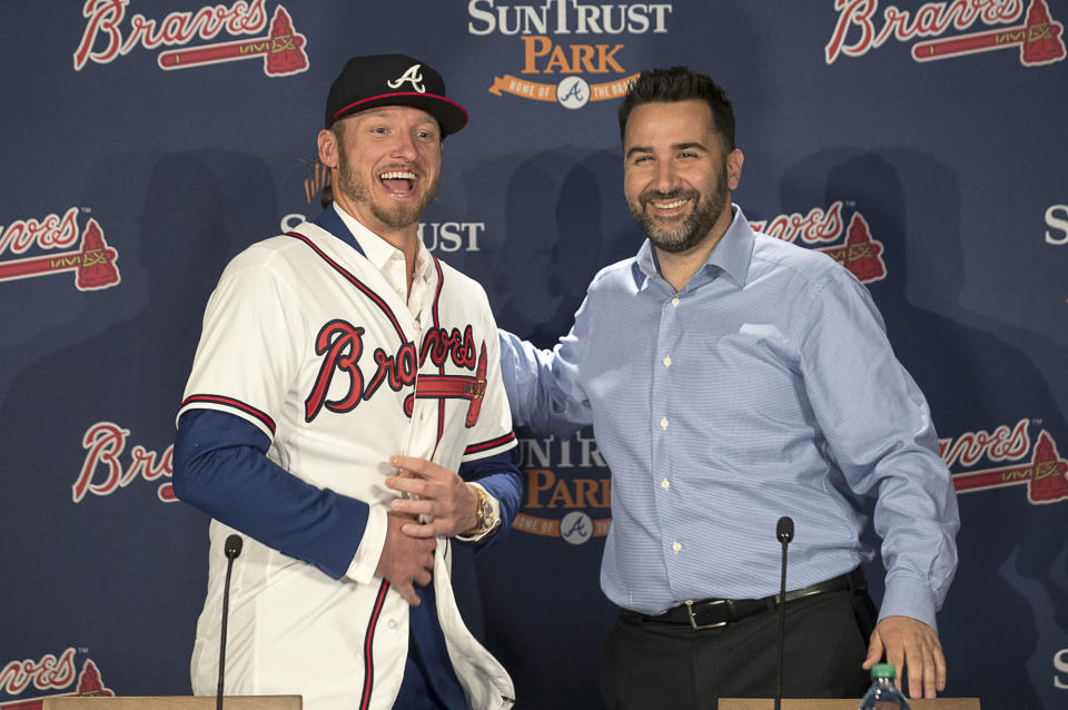 Atlanta Braves general manager Alex Anthopoulos, right, introduces Josh Donaldson during a baseball press conference Tuesday, Nov. 27, 2018, in Atlanta. (Alyssa Pointer/Atlanta Journal-Constitution via AP)