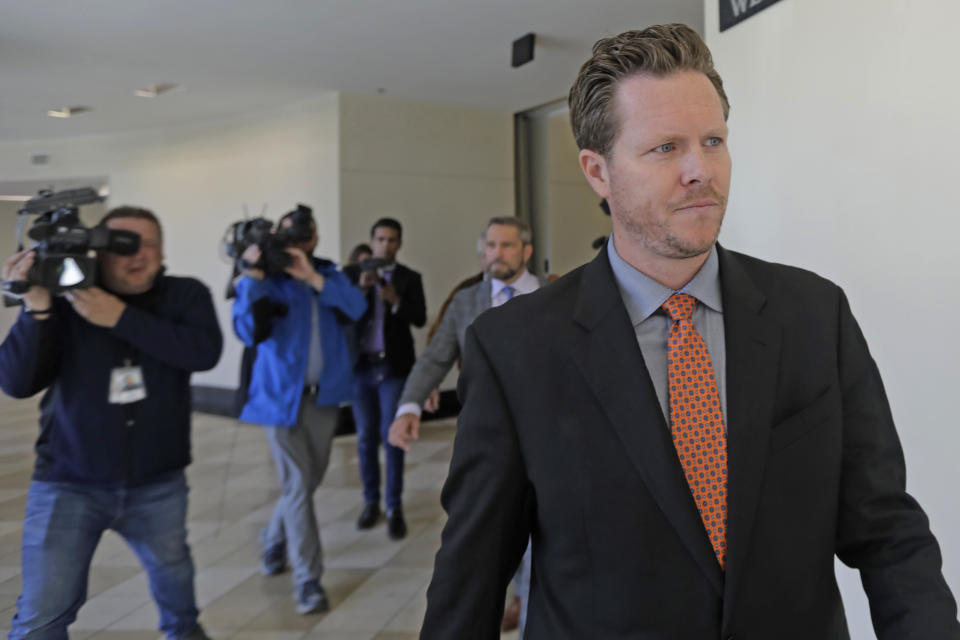 File - In this Nov. 15, 2019, file photo, Paul Petersen, an Arizona elected official accused of running a multi-state adoption scheme, leaves court following an initial appearance on charges filed in the state in Salt Lake City. A woman accused of aiding a politician in metro Phoenix in what authorities say was an illegal adoption scheme involving women from the Marshall Islands has pleaded guilty to conspiracy and theft charges. Lynwood Jennet admitted in court Thursday, Dec. 19, 2019, that she helped arrange benefits from Arizona's Medicaid program for expecting mothers who did not reside in the state. (AP Photo/Rick Bowmer, File)