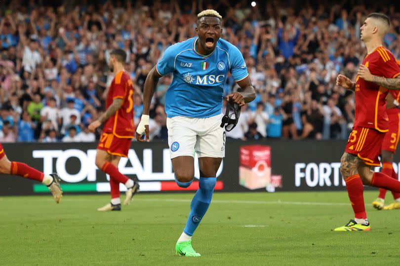 Victor Osimhen celebrates after scoring his side second goal during the Serie A match between SSC Napoli and AS Roma.