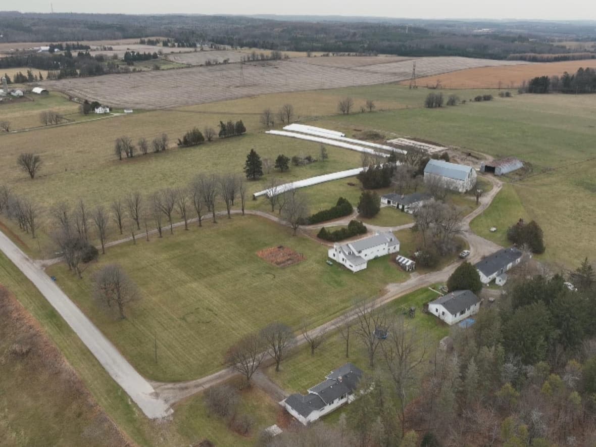 An image taken from a drone shows an area of protected farmland in the Township of King, approximately a 45 minute drive north of Toronto. The province is proposing to open up this area of the Greenbelt and an adjacent area of the Oak Ridges Moraine for housing. The local council says it would rather see a new hospital there. (Yan Theoret/CBC - image credit)