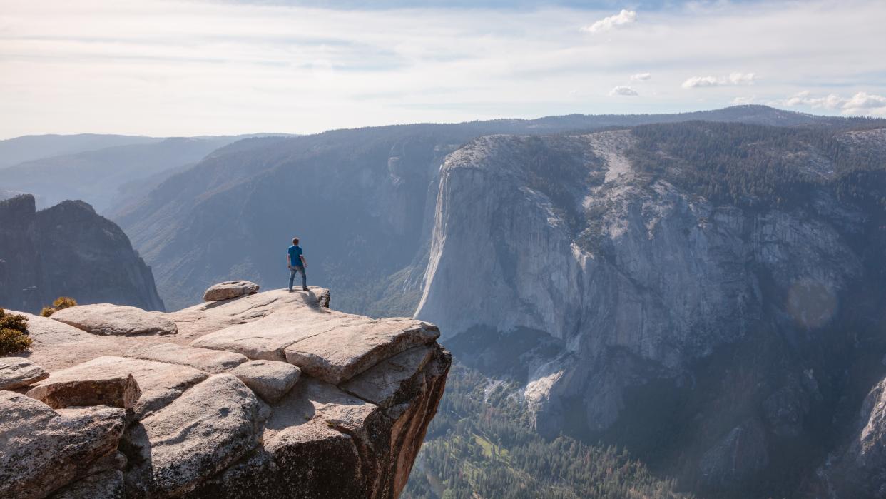  Man standing on Taft Point, Yosemite 