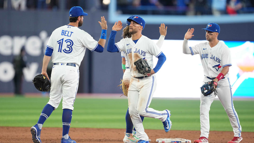 Kevin Kiermaier (centre) and Whit Merrifield (right) have been instrumental in the Blue Jays' early season success. (Nick Turchiaro-USA TODAY Sports)