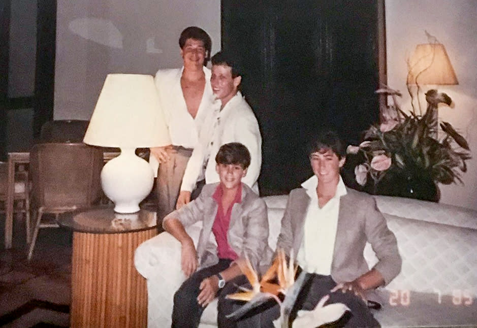 Richard Kleiman, left, and his friend Jay Kleiman, right, with Tommy and Michael Babi, both sitting, in Dorado, Puerto Rico, around 1985. (Courtesy Michael Babil)