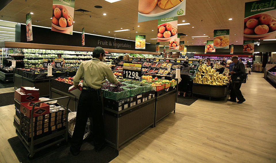 Generic photo of Woolworths supermarket customers moving through the aisles of the supermarket.