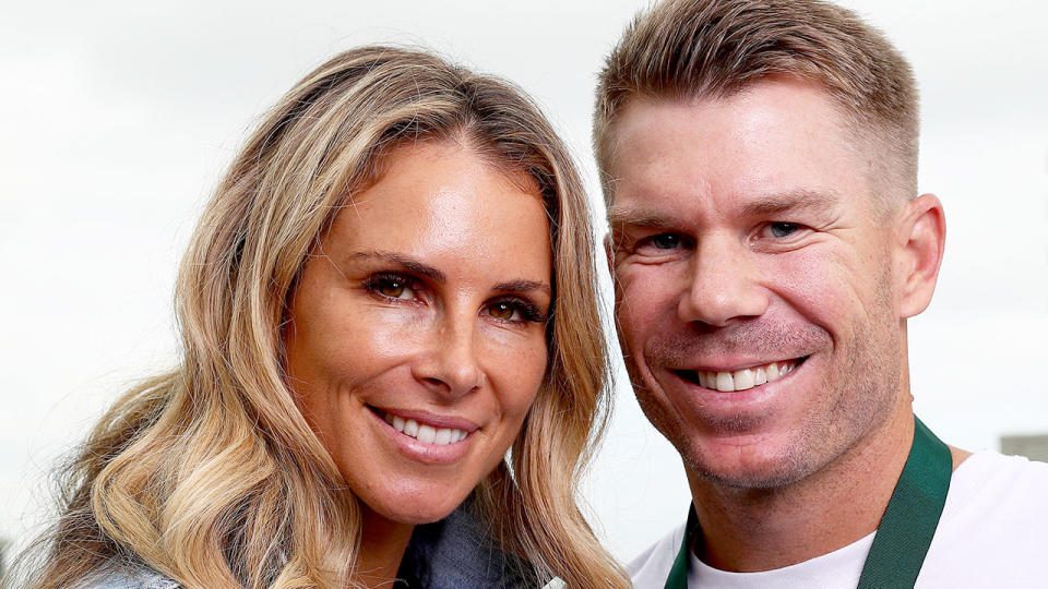 David Warner and his wife Candice are seen here posing for a photo together.