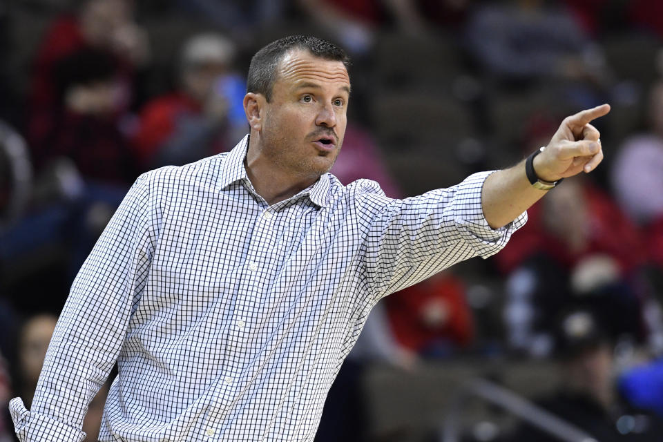 Louisville head coach Jeff Walz shouts instructions to his team during the second half of an NCAA college basketball game in Highland Heights, Ky., Sunday, Dec. 8, 2019. Louisville won 85-57. (AP Photo/Timothy D. Easley)