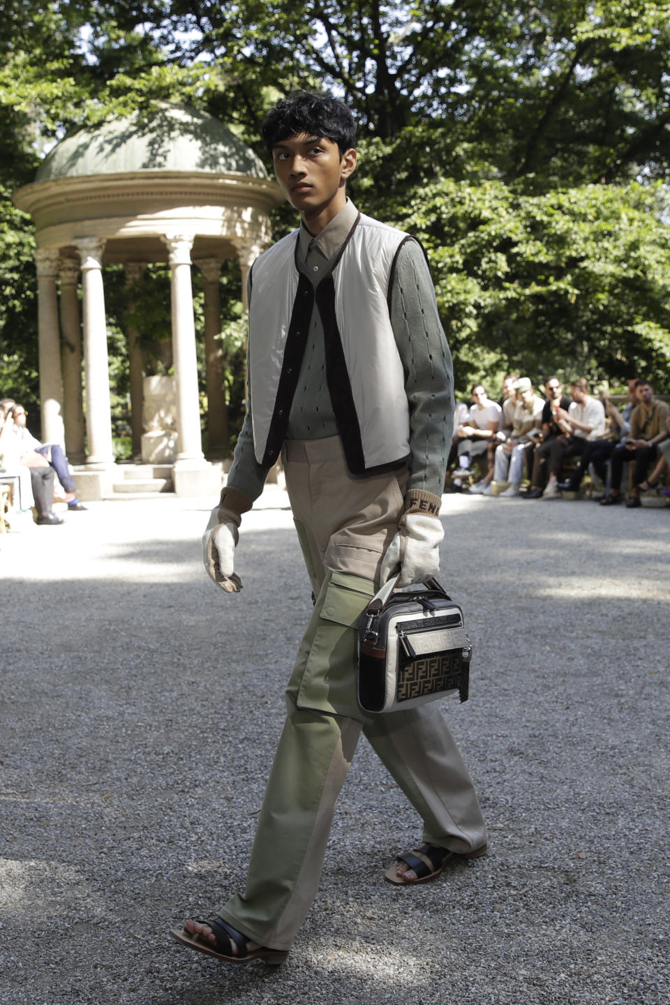 A model wears a creation as part of the Fendi men's Spring-Summer 2020 collection, unveiled during the fashion week, in Milan, Italy, Monday, June 17, 2019. (AP Photo/Luca Bruno)