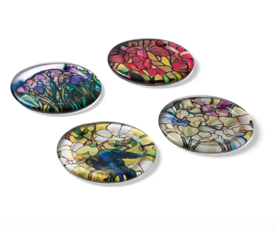 These coasters are taken from the works of Louis C. Tiffany, who was known for his stained glass. <a href="https://fave.co/3mSHUPt" target="_blank" rel="noopener noreferrer">Find the set for $28 at the Met Store</a>.