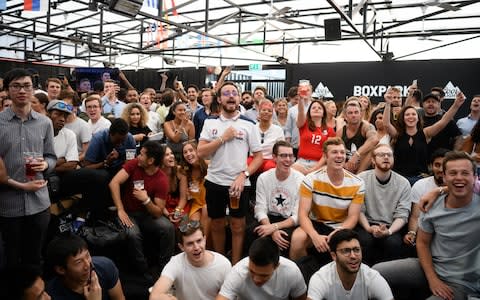 Fans gather to watch England in London