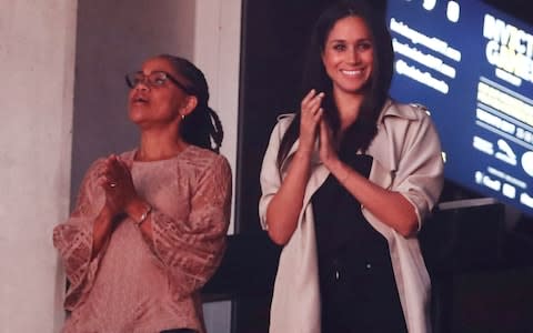 Meghan Markle and her mother, Doria Ragland, watch the closing ceremony for the Invictus Games in Toronto - Credit:  REUTERS