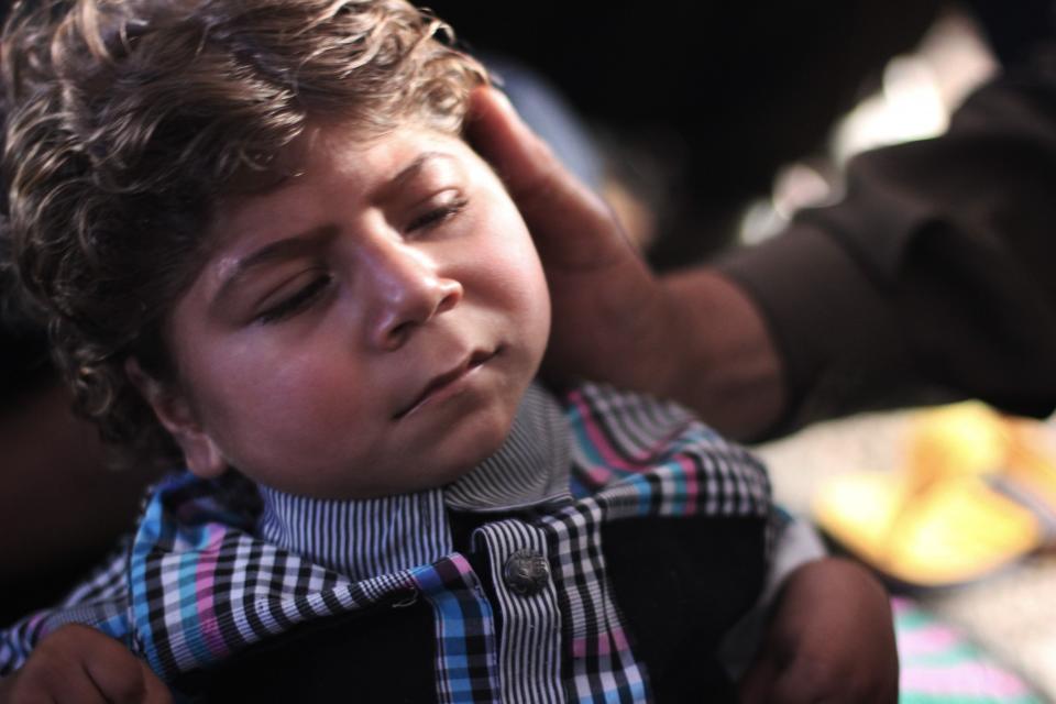 An internally displaced boy with brain damage hasn't had medical attention in weeks