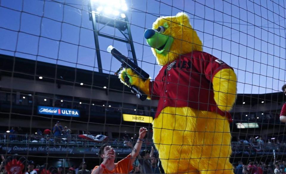 Parker the Fresno Grizzlies mascot interacts with the fans at the season opener against the Stockton Ports Friday, April 8, 2022 at Chukchansi Park in Fresno.