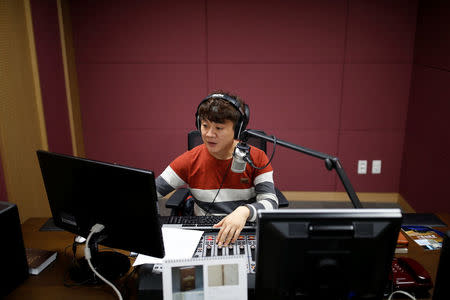 Kim Chung-seong, a North Korean defector and a Christian missionary, prepares a radio broadcast at a radio station in Seoul, South Korea, April 21, 2016. REUTERS/Kim Hong-Ji