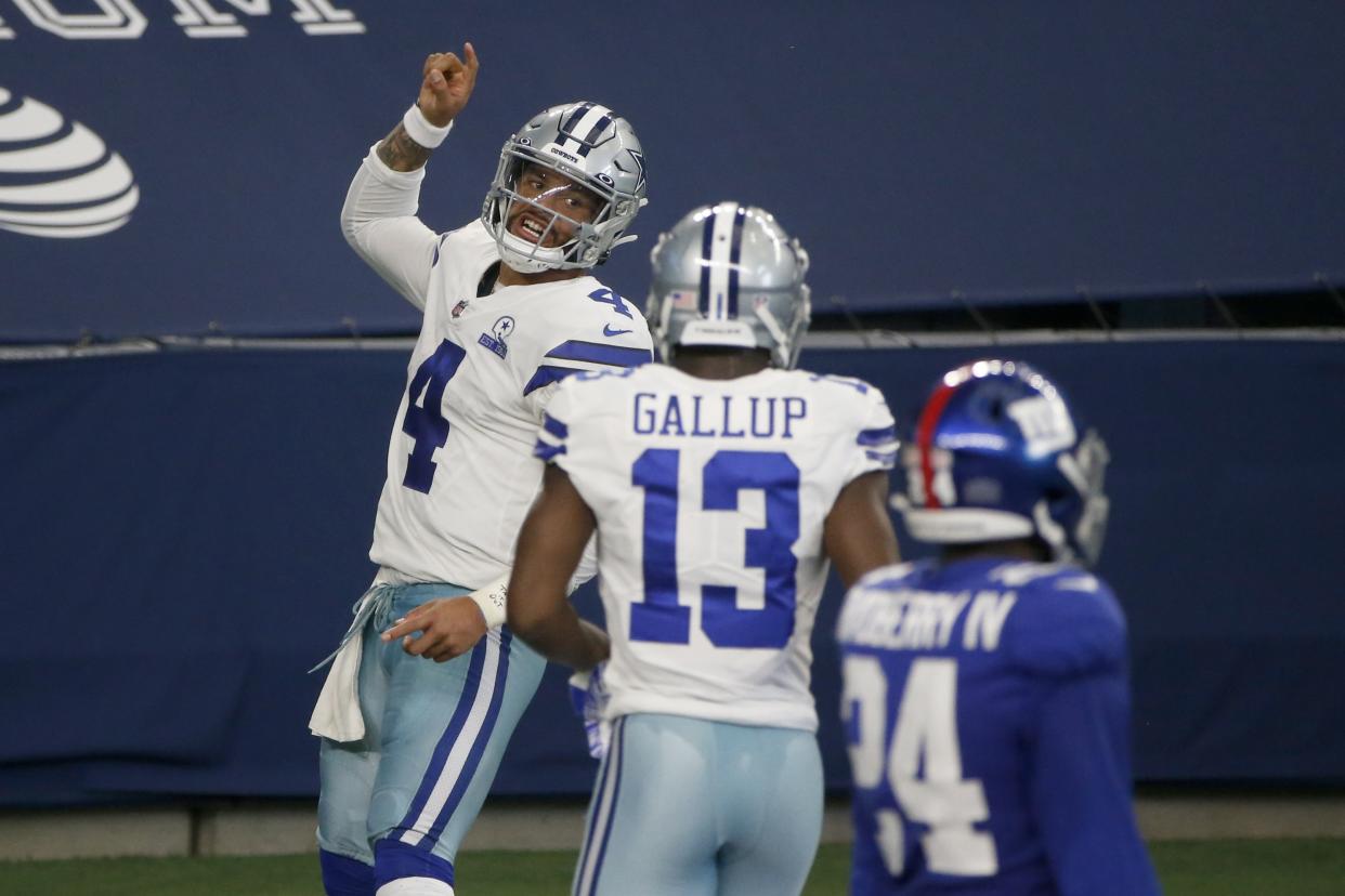 Dak Prescott was the first Dallas Cowboys quarterback to catch a touchdown pass since 1985. (AP Photo/Michael Ainsworth)