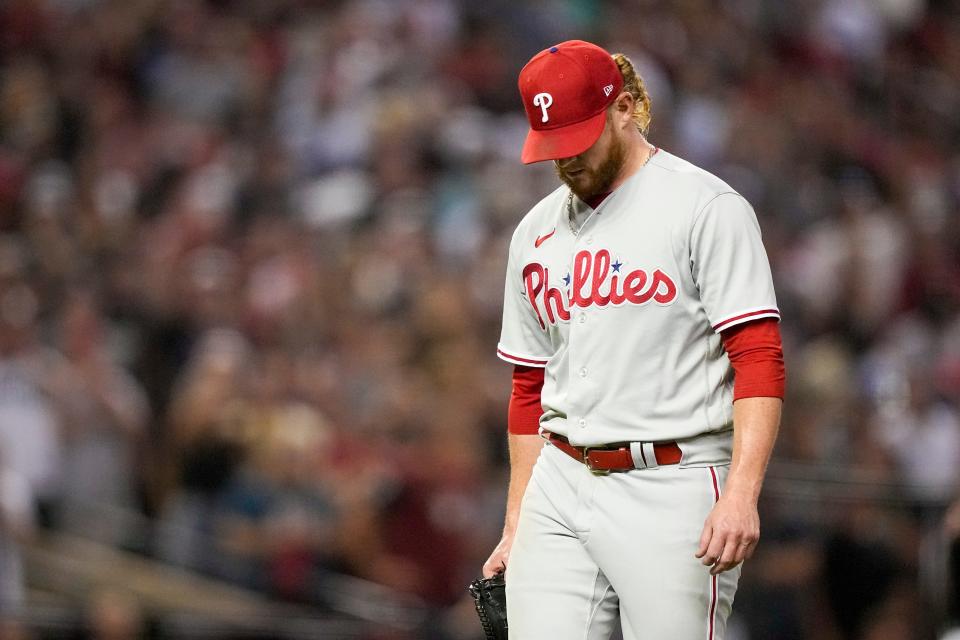 Philadelphia Phillies relief pitcher Craig Kimbrel leaves the game against the Arizona Diamondbacks during the eighth inning in Game 4 of the baseball NL Championship Series in Phoenix, Friday, Oct. 20, 2023.