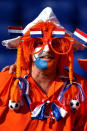 KHARKOV, UKRAINE - JUNE 09: Dutch fans soak up the atmopshere prior to the UEFA EURO 2012 group B match between Netherlands and Denmark at Metalist Stadium on June 9, 2012 in Kharkov, Ukraine. (Photo by Julian Finney/Getty Images)