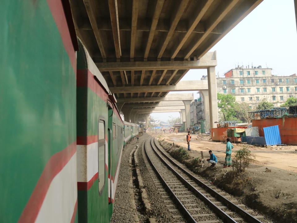 train tracks under an overpass in dhaka bangladesh