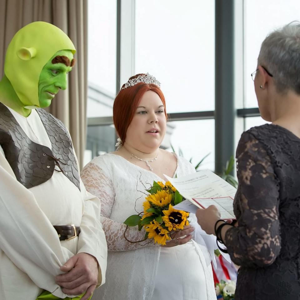 <div class="caption-credit"> Photo by: SWNS</div>Shrek and Princess Fiona take their vows. According to Jersey law, the bride and groom have to be identified, so Paul had his green makeup applied in front of the registrar before the ceremony at the Radisson Hotel.