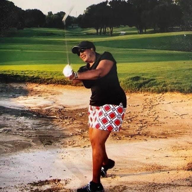Tannie Coward golfing