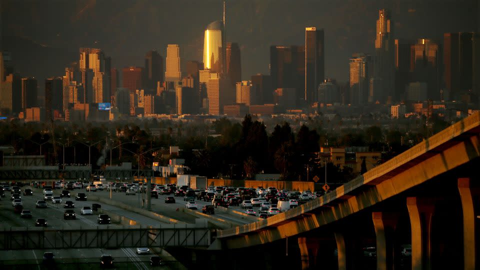 Smog hangs in the air as the sun sets after a hot day in the Los Angeles Basin on October 4, 2023. - Luis Sinco / Los Angeles Time/Getty Images