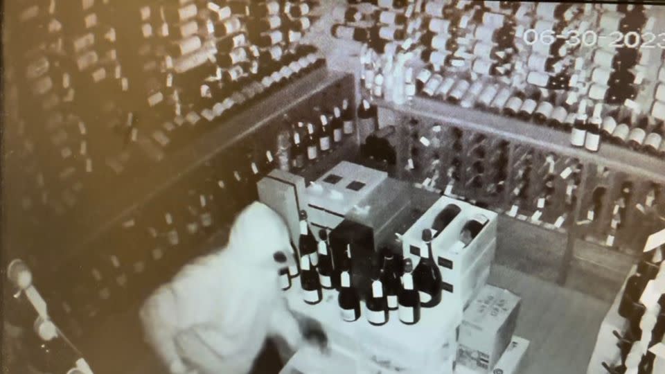 Surveillance video shows a burglar inside the store's wine cellar - Courtesy Lincoln Fine WInes