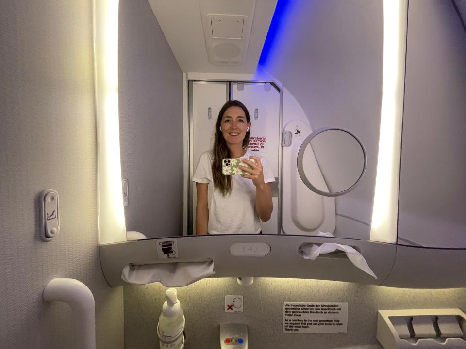 The author avoids sitting near the bathroom at all cost on long-haul flights.