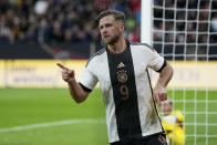 Germany's Niclas Fuellkrug celebrates after scoring his side's second goal during the international friendly soccer match between Germany and Peru at the Opel Arena in Mainz, Germany, Saturday, March 25, 2023. (AP Photo/Michael Probst)