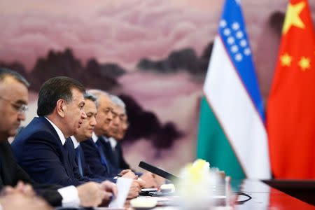 Uzbek President Shavkat Mirziyoyev attends talks with Chinese Premier Li Keqiang (not pictured) at the Great Hall of the People in Beijing, China, May 13, 2017. REUTERS/Thomas Peter