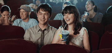 Joseph Gordon-Levitt and Zooey Deschanel at the movie theater in "500 Days Of Summer"