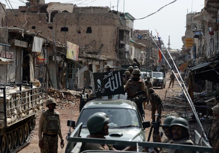 Pakistani soldiers patrol the town of Miranshah in North Waziristan on July 9, 2014