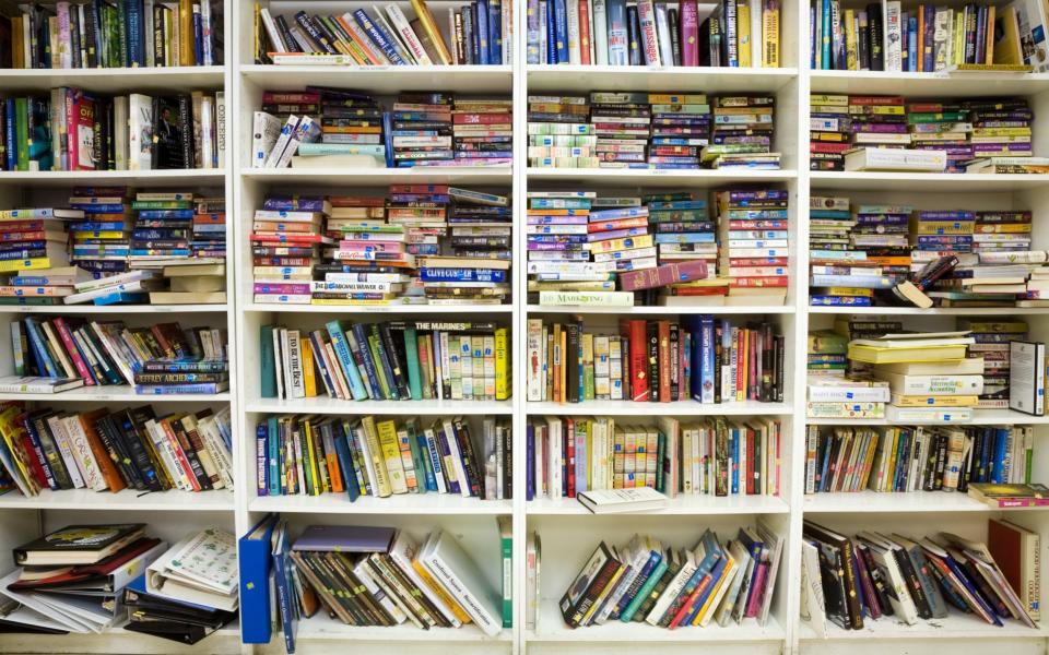 A packed bookshelf - Credit: Cultura RM/Alamy