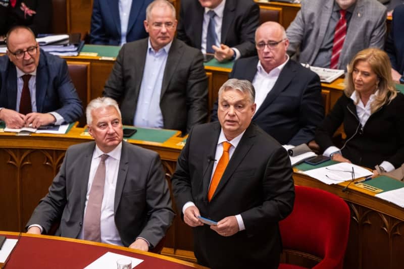 Hungarian Prime Minister Viktor Orban takes part in the parliamentary session prior to the vote on the ratification of Sweden's NATO membership. Marton Monus/dpa