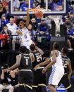 <p>De’Aaron Fox #0 of the Kentucky Wildcats dunks against the Wichita State Shockers in the second half during the second round of the 2017 NCAA Men’s Basketball Tournament at the Bankers Life Fieldhouse on March 19, 2017 in Indianapolis, Indiana. The Kentucky Wildcats won 65-62. (Photo by Joe Robbins/Getty Images) </p>
