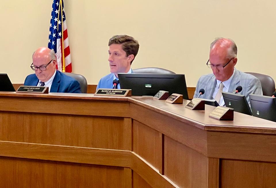 Mayor Chaz Molder, center, addresses a packed room of concerned citizens regarding the 765-home development proposed off Trotwood Avenue during Columbia City Council's regular meeting Thursday, June 8, 2023.