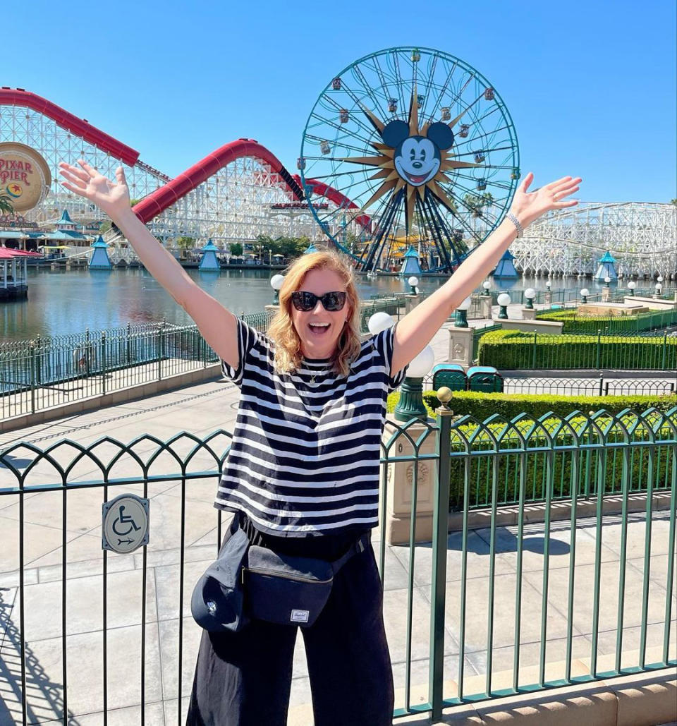 <p><em>The Office </em>alum may have gone to Disneyland for her kids, but she and her husband also had a blast! In a carousel of shots shared on <a href="https://www.instagram.com/p/Ci_IadgPkyg/" rel="nofollow noopener" target="_blank" data-ylk="slk:Instagram;elm:context_link;itc:0;sec:content-canvas" class="link ">Instagram</a>, the actress posed in front of Cinderella's castle and even got a quick photo op with Chewbacca.</p> <p>"We took the kids but Mom and Dad had just as much fun! My favorite rides are Cars Radiator Springs Racers and Soarin' in Disney California Adventure Park. Splash Mountain and Rise of the Resistance in Disneyland Park. (<a href="https://www.instagram.com/angelakinsey/" rel="nofollow noopener" target="_blank" data-ylk="slk:@angelakinsey;elm:context_link;itc:0;sec:content-canvas" class="link ">@angelakinsey</a> I know how happy you are that I got a photo with Chewbacca.) Oh and both parks are decorated for Halloween right now. I love it! (I'm a nerd for Holiday decor 🎃)," she captioned the post.</p>