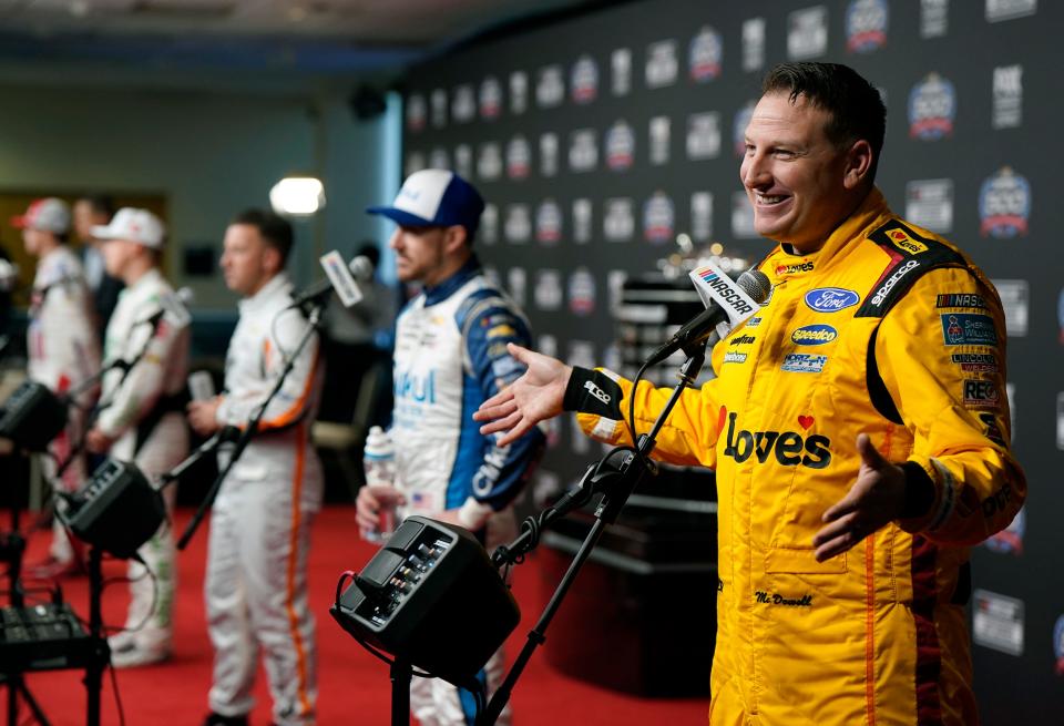 Michael McDowell along with other drivers answers questions from the media during Media Day at Daytona International Speedway, Wednesday, Feb. 14, 2024.