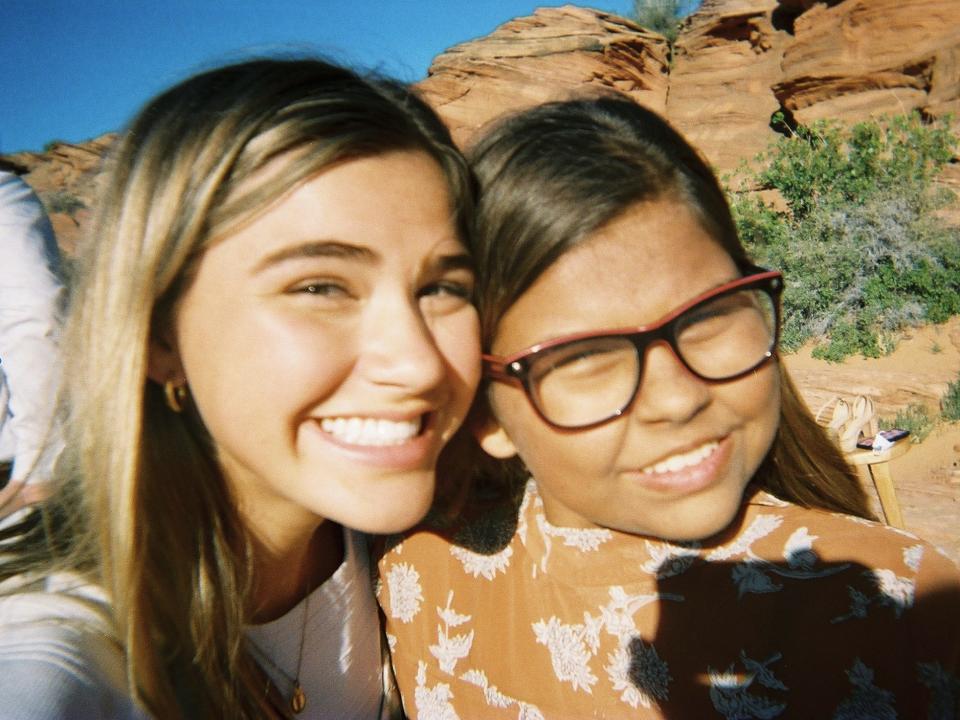 Two women taking a selfie together.