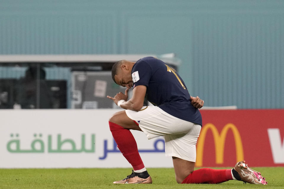 France's Kylian Mbappe celebrates after scoring his sides first goal during the World Cup group D soccer match between France and Denmark, at the Stadium 974 in Doha, Qatar, Saturday, Nov. 26, 2022. (AP Photo/Thanassis Stavrakis)