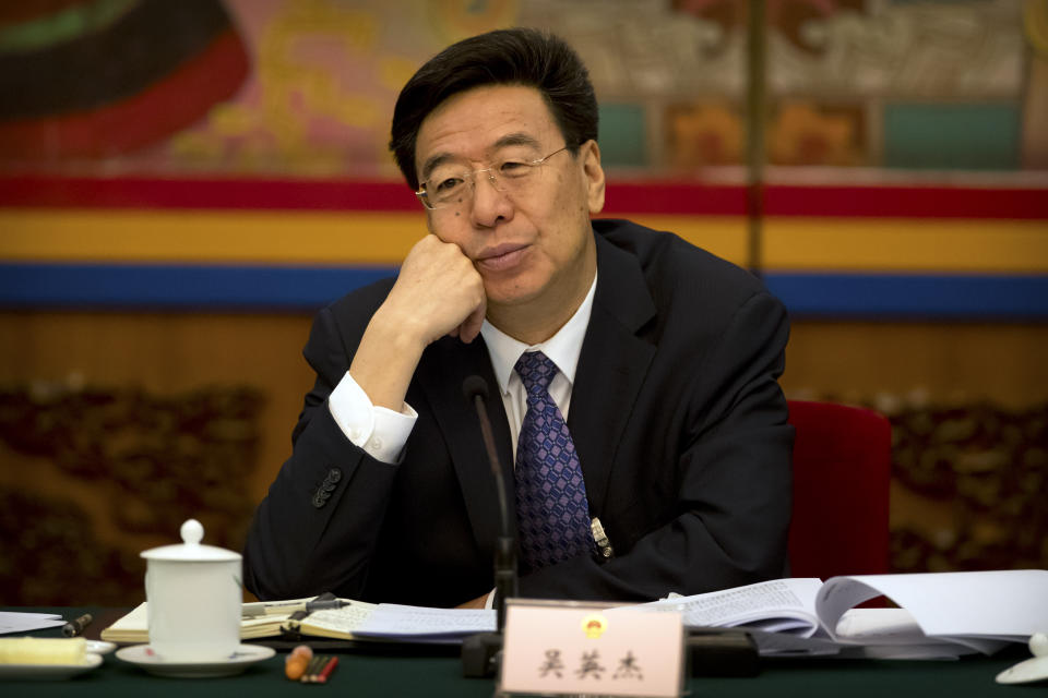 Wu Yingjie, Communist Party secretary of the Tibetan Autonomous Region, attends a group discussion session held on the sidelines of the annual meeting of China's National People's Congress (NPC) in the Tibet Hall of the Great Hall of the People in Beijing, Wednesday, March 6, 2019. The Chinese Communist Party chief for Tibet said on Wednesday that the Dalai Lama has not done a "single good thing" for the region. (AP Photo/Mark Schiefelbein)